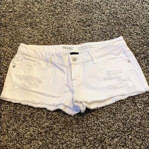 White low rise distressed jean shorts